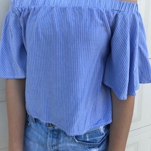 Off the shoulder shirt.